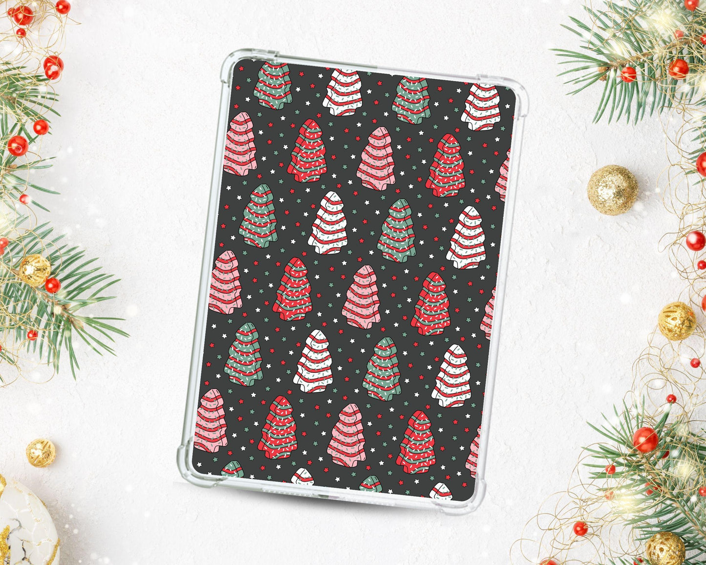 a tablet case sitting on top of a table next to christmas decorations