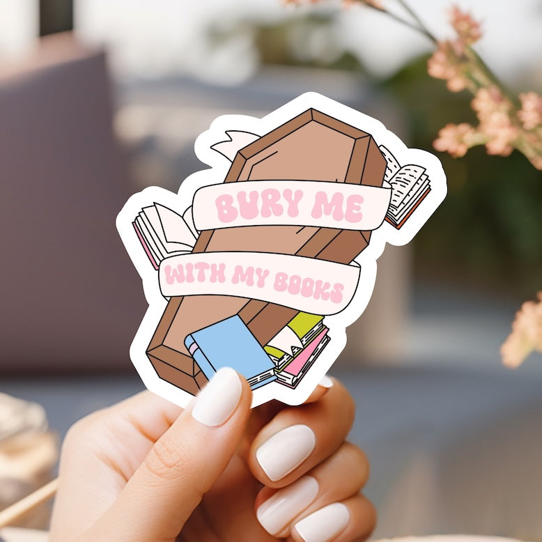 a person holding a sticker with a picture of a chest