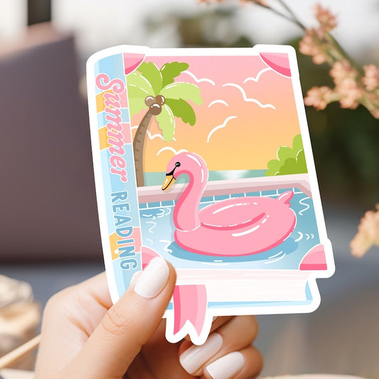 a person holding a sticker with a pink flamingo on it