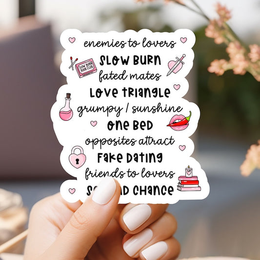 a person holding up a sticker with words on it