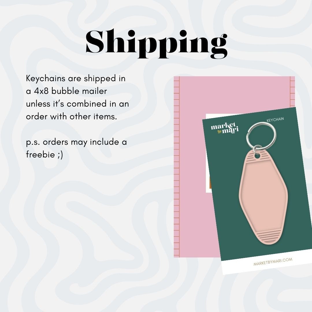 a keychain is shaped in a pink rubber