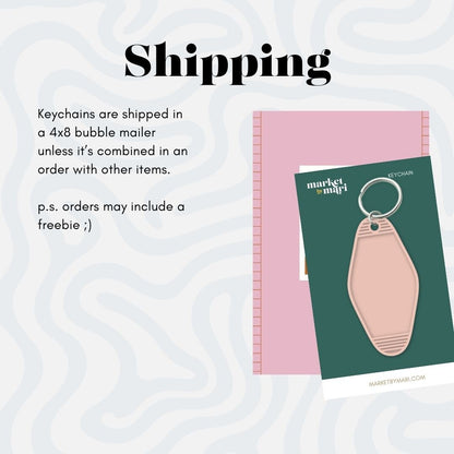a keychain is shaped in a pink rubber