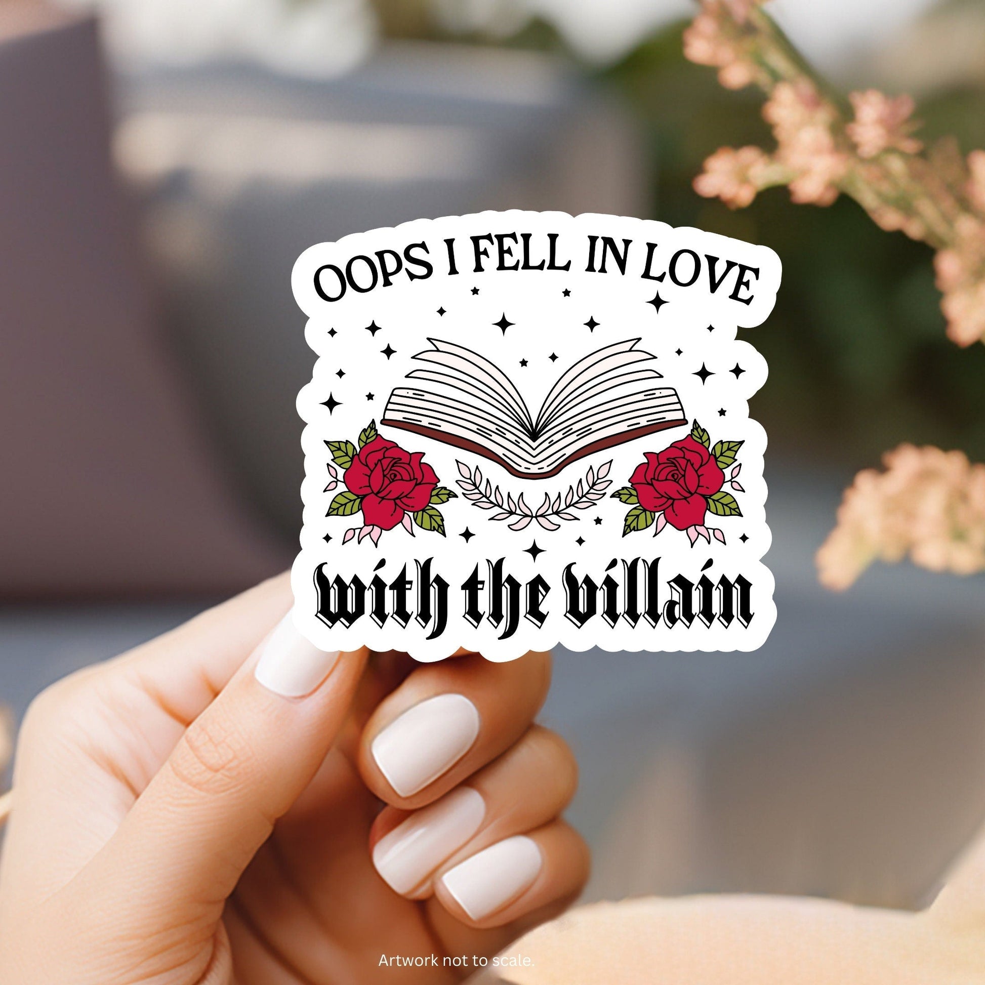 a person holding a sticker that says oops i fell in love with the