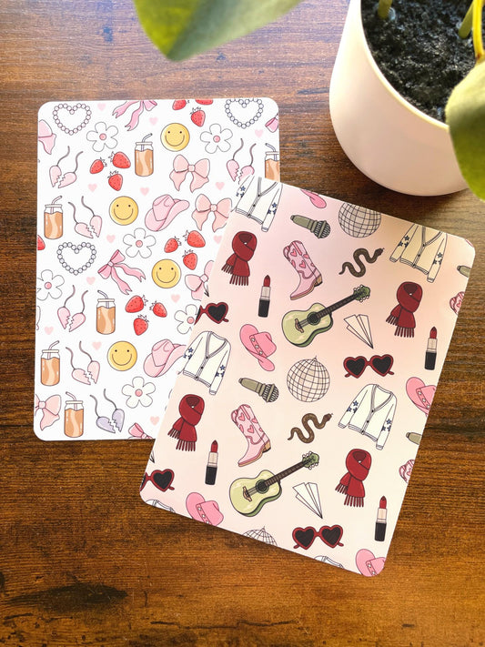 a couple of cards sitting on top of a wooden table