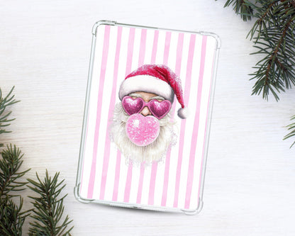 a picture of a santa clause on a pink and white striped background