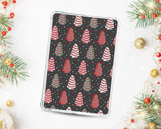 a tablet case sitting on top of a table next to christmas decorations